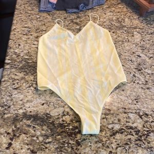 Women yellow bodysuit